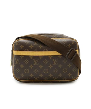 Crossbody schoudertas
  Verstelbare riem
  Ritssluiting