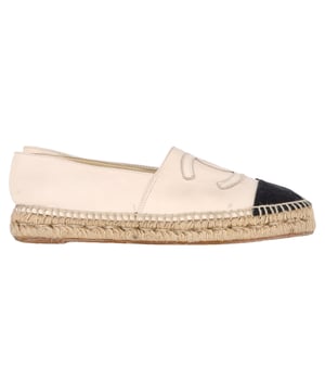 VINTAGE, RRP AS NEW
 Step into timeless elegance with the **Chanel CC Espadrille Flats** in supple cream leather, featuring the iconic interlocking CC logo for an unmistakably chic finish. These flats blend Parisian sophistication with effortless comfort, making them perfect for everyday luxury. **Style tip:** Pair them with a flowy midi dress or cropped denim and a tweed blazer for a classic, feminine ensemble.

Chanel CC Espadrille Flats in Cream Leather

Condition: Very good
Signs of wear: Minor markings, Lightly used but very well maintained. Minor mark at soles & creasing, light scuffing at the soles and heels.
Packaging: None
Color: Cream
Material: Leather
Size: FR | 38
Measurements: Heel height: 30; Insole length: 270
SKU: NAPPUGBSH533499W