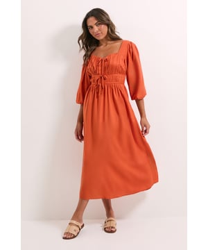 Elegant shirred bodice with delicate tie detail at the sweetheart neckline
        Flowing midi length with a relaxed silhouette perfect for day-to-evening wear
        Charming three-quarter length balloon sleeves for a feminine touch
        Flattering elasticated back detail that creates a beautifully defined waistline
        Lightweight woven viscose fabric offering comfort and graceful movement
    
    This Dorothy Perkins midi dress combines effortless style with thoughtful details for your everyday wardrobe. The shirred bodice creates a flattering fit while the sweetheart neckline with tie detail adds a touch of romance. Style with flat sandals as shown for casual brunches with friends or family gatherings. For cooler days, layer with a lightweight cardigan and ankle boots. The versatile design transitions beautifully from daytime outings to informal evening events-simply swap your sandals for block heels and add delicate jewellery. The soft, flowing fabric moves gracefully with you, making this the perfect fuss-free option when you want to look polished without trying too hard. An essential piece for the woman who values both comfort and style in her everyday fashion choices.