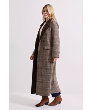 Striking check pattern with contrasting solid lapels for a sophisticated twist
        Midi length design offering extra warmth and coverage
        Double-breasted front with button fastening for a classic silhouette
        Practical side pockets to keep essentials close at hand
        Fully lined interior ensuring comfort and structure throughout the day
    
    This Dorothy Perkins Check Contrast Midi Coat combines timeless pattern with contemporary styling. The elegant midi length and contrasting lapels create a refined look that works beautifully for everyday occasions. Style with denim jeans and ankle boots for weekend brunches with friends, or layer over a simple jumper and straight-leg trousers for family gatherings. The regular fit allows for comfortable layering during cooler months without feeling restrictive. Perfect for the woman who appreciates classic design with a modern touch, this coat transitions effortlessly from casual coffee dates to baby showers. The versatile check pattern adds interest to your autumn and winter wardrobe whilst maintaining a polished appearance that never feels overdressed. Pair with a cross-body bag and simple jewellery for an effortlessly chic daytime ensemble.