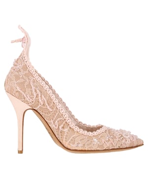 VINTAGE, RRP AS NEW
Delicate and romantic, the Dior Lace-Embellished Pointed Pumps in pink polyester feature intricate lace detailing that adds a touch of feminine charm. The pointed toe and slim heel create a graceful silhouette perfect for elegant occasions. **Style tip:** Pair them with a flowy pastel dress or tailored cream trousers to highlight their soft, romantic elegance.

Dior Lace-Embellished Pointed Pumps in Pink Polyester

Condition: Excellent
Signs of wear: No visible sign of wear. No Mark at insole.,  Very light mark at soles.
Packaging: None
Color: Pink
Material: Polyester
Size: EU | 37
Measurements: Heel height: 100; Insole length: 280
SKU: NAPPUGBSH528576W