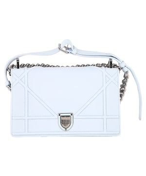 VINTAGE, RRP AS NEW
Refined and contemporary, the Dior Small Diorama Flap Shoulder Bag in blue lamb leather features the signature Cannage motif and metallic crest clasp for a bold, architectural finish. Its compact size and structured shape make it the perfect statement piece for day-to-night elegance. **Style tip:** Pair it with a white blouse and high-waisted trousers or a flowy midi dress to let the rich blue hue pop with effortless sophistication.

Dior Small Diorama Flap Shoulder Bag in Blue Lamb Leather

Condition: Excellent
Signs of wear: No retail tag, No visible sign of wear., 
Packaging: Dust bag
Color: Blue | light blue
Material: Leather | lambskin leather
Size: One Size | One Size
Measurements: Width: 55; Height: 130; Length: 215
SKU: NAPPUGBBA528581W