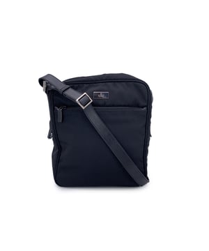 VINTAGE, RRP AS NEW
Designed with versatility and city-smart style in mind, this Gucci black nylon canvas crossbody messenger bag is a unisex essential that blends function with iconic design. Crafted from durable black nylon with a minimalist edge, it's built for life on the move.  The upper zipper closure opens to a black fabric-lined interior, complete with a secure side zip pocket for your smaller essentials. On the front, a zip pocket adds extra utility, while the adjustable shoulder strap ensures a perfect fit whether worn crossbody or over the shoulder.  Sleek, lightweight, and unmistakably Gucci-this is the kind of bag that works seamlessly from weekday commute to weekend travel. 'Gucci - Made in Italy' tag inside (with serial number on its reverse)  Condition Rating: A - EXCELLENTCondition Details: Gently used. Please check the images carefully. Please ask if you need to know more details or if you have any doubts. Other Details: Dustbag? Keys? Box? ?: No Measurments:  strap length: 0 mm handle drop: 0 mm