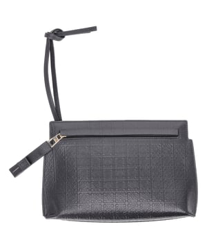 VINTAGE, RRP AS NEW
The Loewe Mini Repeat Embossed T-Pouch Bag in black calf leather is a sleek statement piece, showcasing the brand's signature anagram in a subtly embossed repeat pattern. Its compact silhouette and detachable strap offer versatile styling—from shoulder bag to handheld clutch. **Styling tip:** Elevate your minimalist outfit by pairing it with a tailored black jumpsuit and gold jewelry, letting the textured leather add depth and refinement.

 Loewe Mini Repeat Embossed T-Pouch Bag in Black Calf Leather

Condition: Excellent
Signs of wear: No retail tag, No visible sign of wear., 
Packaging: None
Color: Black
Material: Leather | calfskin leather
Size: One Size | One Size
Measurements: Width: 40; Height: 150; Length: 220; Handle drop: 300; Strap length: -
SKU: NAPPUDEBA544728W