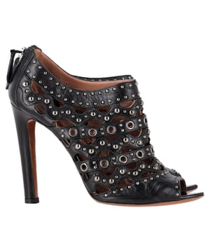 VINTAGE, RRP AS NEW
The Alaïa Studded Lasercut Sandal Heels in Black Leather are a striking blend of artistry and edge, featuring intricate laser-cut patterns adorned with gleaming studs. Expertly crafted in Italy, these heels showcase sculptural elegance and bold sophistication. **Style Tip:** Wear them with a sleek black dress or tailored jumpsuit to highlight their statement-making design and intricate detail.

 Alaia Studded Lasercut Sandal Heels in Black Leather

Condition: Very good
Signs of wear: Minor markings, Lightly used but very well maintained. Minor mark at soles & creasing, light scuffing at the soles and heels.
Packaging: Dust bag
Color: Black
Material: Leather |  leather
Size: EU | 39
Measurements: Heel height: 115; Insole length: 290
SKU: NAPPUGBSH541968W