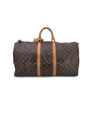 VINTAGE, RRP AS NEW
Embark on your next adventure with the Louis Vuitton Keepall 55, a quintessential travel bag that effortlessly blends timeless luxury with ultimate functionality. Crafted from Louis Vuitton's iconic monogram canvas, this bag is beautifully complemented by beige leather trim, giving it a refined yet practical look. Its spacious interior is lined with brown canvas, offering ample room for all your travel essentials.  The Keepall 55 features a double zip closure. The rounded leather handles offer comfort, whether you're carrying it by hand or using the removable shoulder strap for hands-free convenience.  The leather ID tag adds a personal touch. The 'LOUIS VUITTON Paris - Made in France' engraving on the leather tab on the side. Inside, the bag also features an engraved data code, ensuring its provenance. This Louis Vuitton Keepall 55 is more than just a travel bag-it's a statement piece that will accompany you on journeys, both near and far, with effortless style.   Condition Rating: B - VERY GOOD CONDITIONCondition Details: Some darkness and scratches on leather trim. Some darkness on the hardware.Some normal wear of use on bottom corners. The original shoulder strap is missing. Padlock and key are included. Please check the photos carefully and ask if you need to know more details or if you have any doubts.Measurements (cm):Depth: 25.4Height: 29.2Length: 55.2Other Details: Dustbag? NoKeys? YesBox? No Measurments:  width: 254 mm length: 552 mm height: 292 mm strap length: 0 mm handle drop: 0 mm