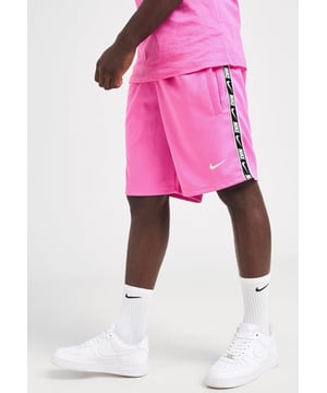 Nike Mens Repeat Shorts Tape Logo Polyester Shorts; these shorts are made from a soft polyester fabric for lasting comfort. - -. They feature an elasticated waistband with a drawcord. - - . From the streets to the sofa, freshen up your off-duty rotation with these men's tape shorts from Nike.