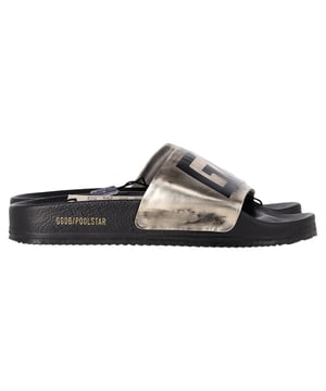VINTAGE, RRP AS NEW
 Step into effortless cool with the Golden Goose Poolstar Slides in silver leather, blending laid-back comfort with bold, metallic shine. These slides feature a cushioned footbed and signature distressed finish, making them a standout choice for casual, off-duty looks. **Styling tip:** Pair them with cropped denim and an oversized white shirt for a relaxed, street-style vibe with a luxe twist.

Golden Goose Poolstar Slides in Silver Leather

Condition: Excellent
Signs of wear: No visible sign of wear. No Mark at insole.,  Very light mark at soles.
Packaging: None
Color: Silver
Material: Leather
Size: EU | 38
Measurements: Heel height: 300; Insole length: 260
SKU: NAPPUGBSH506844W