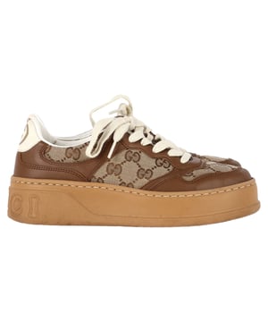 VINTAGE, RRP AS NEW
Step out in iconic style with the women’s Gucci GG Trainer Sneakers in brown canvas and leather, featuring the signature GG monogram for a timeless look. Combining classic materials with a modern silhouette, these sneakers deliver both comfort and luxury for everyday wear. **Styling tip:** Pair them with tailored trousers and a crisp white blouse to balance sporty elegance with polished sophistication.

Gucci GG trainer Sneakers in Brown Canvas and Leather

Condition: Excellent
Signs of wear: No visible sign of wear. No Mark at insole.,  Very light mark at soles.
Packaging: None
Color: Brown | ochre
Material: Canvas
Size: IT | 35.5
Measurements: Heel height: 45; Insole length: 260
SKU: NAPPUGBSH494365W