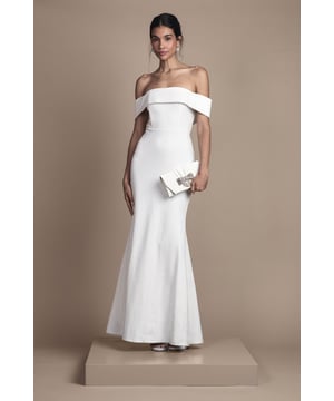 Elegant Bardot neckline with off-shoulder design for a sophisticated bridal silhouette
        Figure-enhancing ponte fabric that offers structure and comfort throughout your special day
        Streamlined maxi length with graceful fishtail hem that creates a stunning floor-sweeping effect
        Clean, minimalist design perfect for the modern bride seeking timeless elegance
        Structured bodice that sculpts and defines your natural shape for a flattering fit
    
    Make a striking impression on your wedding day with this beautifully crafted Bardot maxi dress from Coast. The elegant off-shoulder neckline frames your dcolletage whilst the structured ponte fabric ensures a smooth, flattering silhouette that maintains its shape as you celebrate your special day. The clean lines and minimalist design reflect contemporary bridal elegance, whilst the floor-length cut with subtle fishtail hem creates graceful movement as you walk down the aisle. Style with delicate jewellery and a sleek updo to showcase the beautiful neckline, adding a cathedral veil for traditional ceremonies or a shorter style for a more modern approach. Complete your bridal look with satin heels and a small clutch, as shown, for a refined ensemble that photographs beautifully from every angle.