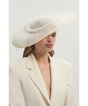 Showcasing an innovative combination of pleated mesh and pearl details, this fascinator adds an elegant finishing touch to occasionwear ensembles.Browse this seasons women's fascinators or discover the full range of women's accessories now.