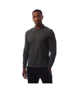 Mens C.P. Company Stretch Piquet Long Sleeve Polo Shirt in dark shadow.- Ribbed polo collar.- Two button placket.- Long sleeves with ribbed cuffs.- Embroidered logo patch at left chest.- Split hem to the sides.- Tonal back neck tape.- Regular fit.- 95% Cotton  5% Elastane.  Machine washable.- Ref: 19CMPL093A 005263W 978