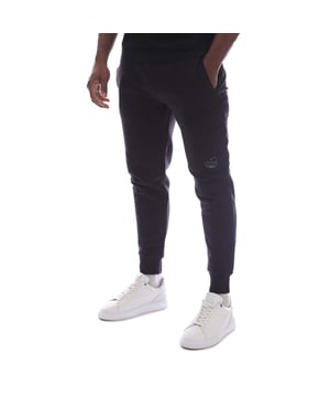 Mens C.P. Company Diagonal Fleece Lens Cargo Sweatpants in black.Sweatpants crafted in Diagonal Raised Fleece  a medium-weight brushed diagonal-weave cotton.  The soft fabric ensures comfort and ease of movement.  - Ribbed elasticated waist with inner drawcord.- Side welt pockets.- Cargo pocket on left leg with iconic C.P. Company lens detail.- Tapered leg.- Ribbed cuffs.- 100% Cotton.  Machine washable.- Ref: RCCMSP717A 005086W 999