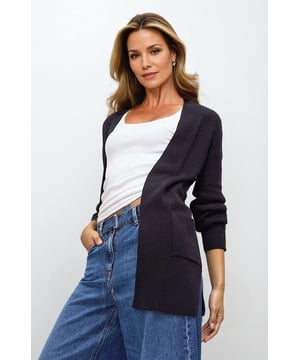 Wrap yourself in effortless comfort with this super soft, drapey open longline cardigan. Designed for ultimate relaxation, it features cozy pockets and a flowing fit that moves with you. Perfect for lounging or layering, this versatile piece elevates your comfort-wear wardrobe while keeping you stylishly snug all day long.

31" Shoulder to Hem.