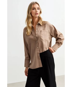 This lightweight shirt is a timeless choice that can be styled up or down for almost any occasion.

28" Shoulder to Hem.