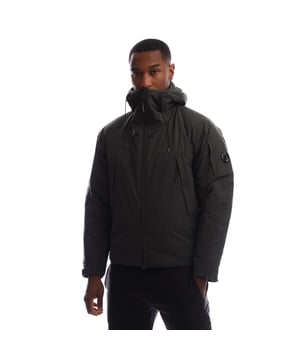 Mens C.P. Company Pro-Tek Hooded Padded Jacket in dark shadow.Hooded padded jacket crafted in Pro-Tek  a Polyester mechanical stretch that combines the weight and comfort of a sweatshirt with the protection of an outer layer.  Padded with Primaloft® Silver wadding  an insulation solution with high thermal and breathability properties. Anti-drop treated.- Fixed hood with adjustable bungee drawcord.- Two-way full zip fastening.- Side hidden zip pockets.- Inside chest pocket.- Iconic C.P. Company lens detail pocket at left sleeve.- Adjustable snap cuffs.- Adjustable bungee drawcord at hem.- Primaloft® Silver padding.- Regular fit.- Main material: 100% Polyester.  Lining: 100% Polyamide.  Padding: 100% Polyester.  Machine washable.- Ref: 19CMOW006A 110264A 978