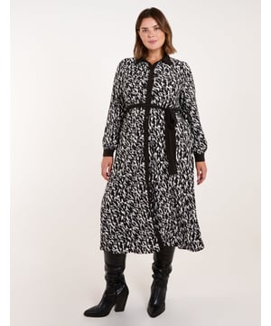 Strip back your style palette, and let the print do the talking wearing this bold monochrome shirt dress.