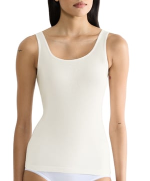 Sloggi GO Sense Tank Top. The GO Sense collection uses super soft modal fabrics designed to keep you comfortable all day. Camisole with a square neck, wide straps and seamless construction. Product is machine washable.