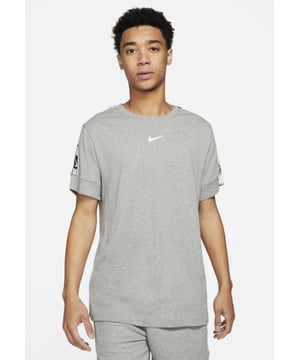 Nike sportswear, pull on this men's Repeat Tape T-Shirt with White and Black taping down the short sleeves, this tee features a ribbed crew neckline and thick, stretchy cuffs to the sleeves. - - . Made from soft cotton fabric, it's finished off with Volt Nike branding on the left cuff and the Swoosh to the chest. - - . Machine washable.