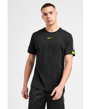 Nike sportswear, pull on this men's Repeat Tape T-Shirt with White and Black taping down the short sleeves, this tee features a ribbed crew neckline and thick, stretchy cuffs to the sleeves. - - . Made from soft cotton fabric, it's finished off with Volt Nike branding on the left cuff and the Swoosh to the chest. - - . Machine washable.