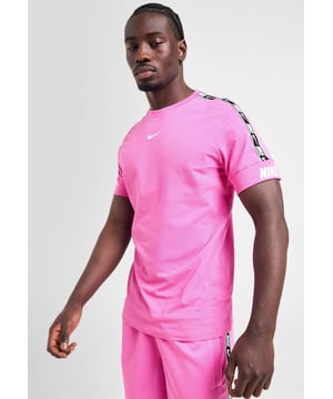 Nike sportswear, pull on this men's Repeat Tape T-Shirt with White and Black taping down the short sleeves, this tee features a ribbed crew neckline and thick, stretchy cuffs to the sleeves. - - . Made from soft cotton fabric, it's finished off with Volt Nike branding on the left cuff and the Swoosh to the chest. - - . Machine washable.