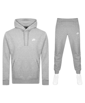 Upgrade your off-duty style with the Nike Grey Club Hooded Tracksuit. Crafted from soft, brushed-back fleece for all-day comfort, this matching set includes a classic pullover hoodie with an adjustable drawstring and a front kangaroo pocket, paired with tapered joggers featuring an elastic waistband and ribbed cuffs for a snug fit. Finished with the iconic Nike Swoosh on both pieces, it’s the perfect blend of sporty style and everyday comfort.