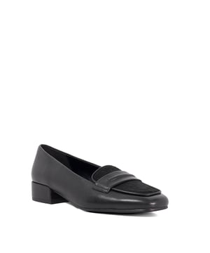 Step into timeless sophistication with Gorgeouss, our elevated take on the classic penny loafer. Crafted from sleek leather and featuring a contrasting upper for a modern twist, this square-toe design is set on a comfortable low block heel. Refined yet versatile, it's the perfect finishing touch for both polished workwear and effortless off-duty looks.