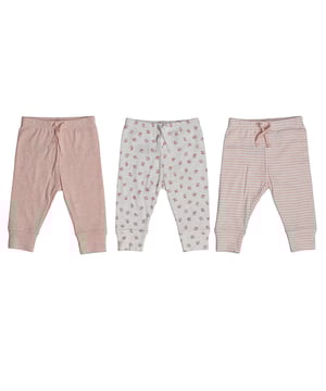 3-Pack Soft Pants GAP for Baby Girls – Comfort and Variety for Everyday Wear\n\n This GAP pants set for baby girls offers an ideal combination of comfort and style. Each piece is made of soft, lightweight jersey, perfect for moving freely. The varied prints add a cute and versatile touch for changing up your look every day.\n\n Details:\n Garment type: Long pants for baby girls.\n Presentation: Pack of 3 units with assorted designs.\n Waist: Elastic with decorative bow.\n Bottoms: Tight cuffs for extra support.\n Fabric: Soft and pleasant cotton knit for baby's delicate skin.\n\n A must-have staple for your baby's wardrobe, designed to offer maximum comfort from the first few months.\n Composition: 100% Cotton\n Care:\nMachine wash cold with like colors.\n Dry at low temperature.\n Iron at medium temperature if necessary.