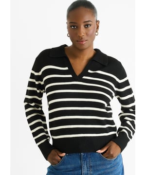 Machen Sie es sich gemütlich und stilvoll mit unserem schwarzen Strickpullover mit V-Ausschnitt und Streifenmuster aus recyceltem Material. Dieser auffällige und bequeme Pullover aus recycelten Materialien verfügt über einen schmeichelhaften V-Ausschnitt und ein trendiges Streifenmuster. Bleiben Sie warm und sehen Sie gut aus, während Sie gleichzeitig die Umwelt schonen.