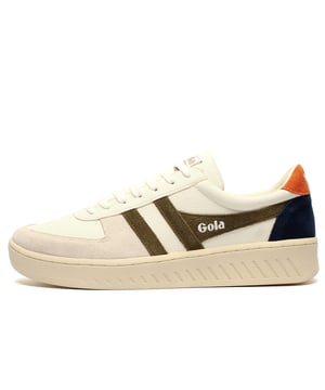 The Trident is a reworked edit of the original. Gola Grandslam trainer.
Inspired by vintage court shoes, the Grandslam Trident Classic blends sharp lines with a true heritage silhouette.
Featuring a sleek leather upper with suede overlays, padded collar, and cushioned insole, these trainers are designed for all-day comfort without sacrificing style. Signature Gola branding and subtle pops of colour give this timeless trainer contemporary edgeperfect for both casual wear and smart styling.

- Leather upper
- Padded heel and ankle collar
- Comfort cushioned insole
- Secure lace up system
- Gola Classics branding throughout