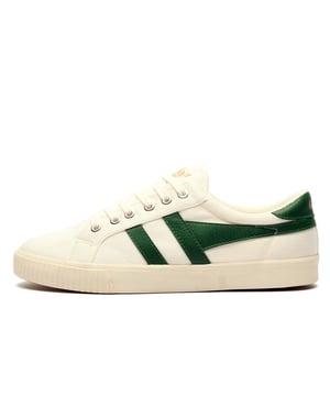A modern update of the original 1973 Gola Tennis shoe, the Gola Classics Mark Cox blends heritage style with contemporary comfort. 
 Featuring an off-white canvas upper, a striking dark green wingflash, and gold Gola branding on the tongue and heel, this silhouette exudes vintage appeal. 
 The sleek, retro-inspired sole delivers a clean, fresh aesthetic, while the padded insole and soft brushed lining enhance all-day comfort. 
 Versatile and easy to style, this classic plimsoll adds a relaxed, sporty edge to any outfit.
 - Premium canvas textile upper
 - Vegan Friendly
 - Lace-up closure
 - Soft terry lining for additional comfort
 - Comfort padded insole
 - Vintage rubber outsole
 - Gola Classics branding throughout