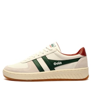 Inspired by vintage court shoes, the Grandslam Classic blends sharp lines with a true heritage silhouette.
Featuring a sleek leather upper, padded collar, and cushioned insole, these trainers are designed for all-day comfort without sacrificing style. Signature Gola branding and subtle pops of colour give this timeless trainer contemporary edgeperfect for both casual wear and smart styling.

- Leather upper
- Padded heel and ankle collar
- Comfort cushioned insole
- Secure lace up system
- Gola classic branding throughout