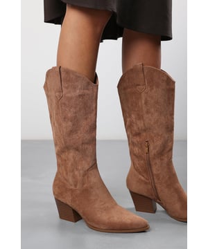 Make a bold style statement with our Brynn Calf Cowboy Boots Block Heel Western Embroidered. Designed with a classic cowboy-inspired silhouette and subtle western embroidery, these boots bring timeless charm with a modern edge. The pointed toe and supportive block heel add elegance and comfort, while the side zip ensures effortless wear. Perfect for styling with denim, dresses, or skirts, these boots are the ultimate blend of western flair and everyday versatility. Key Features: • Material: Soft faux suede with embroidered detailing • Design: Western-inspired calf boot with pointed toe and block heel • Closure: Inner side zip for easy wear