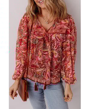 Verfügt über ein wunderschönes Allover-Muster  
Lange Ärmel für vielseitigen Tragekomfort  
Bindedetail am Ausschnitt für zusätzlichen Stil  
Geeignet für verschiedene Anlässe  
Material: 100% Polyester