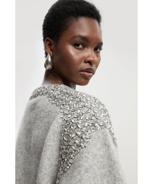 Feel elegant in our knit jumper, with a slouchy silhouette, and a sparkling, embellished trim. Style this piece with jeans or tailored trousers for an outfit that will take you from office days to wintery walks. Embellished Trim Cosy Knit Jumper High Quality Knit Fabric High, Round Neckline Comfortable, Relaxed Silhouette Sparkling, Embellished Detailing