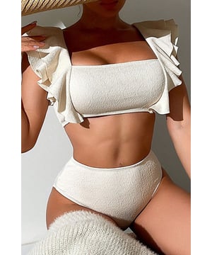 Our styles are designed with a trendy fitted look in mind following an international size standard. For the best fit we suggest choosing one size up from your usual. Be sure to check our sizing chart to find your perfect match!
  Beige textured swimsuit
  Ruffled square neckline
  High
  waisted bottoms for flattering coverage
  Made from fine fabric for an expensive look
  Available in sizes S M L XL
Material: 82% polyester 18% nylon
