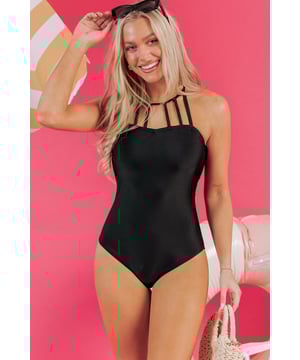 Our styles are designed with a trendy fitted look in mind following an international size standard. For the best fit we suggest choosing one size up from your usual. Be sure to check our sizing chart to find your perfect match!
  Black sleeveless one
  piece swimsuit
  Strappy design with halter neck
  Sweetheart neckline
  Removable cup pads
  High
  quality fabric with high stretch
  Excellent coverage
Material: 82% Polyamide 18% Elastane