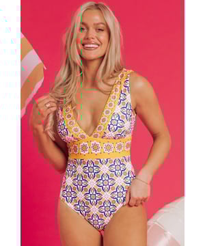 Yellow floral print V neck one piece swimsuit
  Delicate floral pattern
  Flattering V
  neck design enhances the bust
  Sexy streamline silhouette
  Contrast empire waist for enhanced curves and colorblock effect
Material: 82% Polyamide 18% Elastane