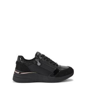 This Statement Zip Runner is crafted from a black leather alternative. There are gunmetal branding details across the upper and the sole is slightly chunky.