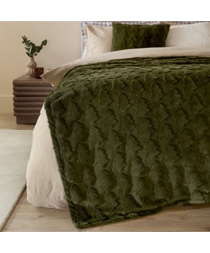 Wrap yourself in the luxurious comfort of the Pines Throw, where elegance meets warmth. Featuring a raised tree design on one side and a smooth, plain velvet reverse, this throw is as stylish as it is cosy. The soft, velvety fibres invite you to run your hands over them, creating a sense of indulgence you'll look forward to every day. Whether you're snuggling up on the sofa during a crisp winter evening or refreshing your space for the holidays, the Pines Throw is the piece that brings both comfort and sophistication into your home.