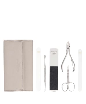 Transform your self-care routine with the Margaret Dabbs London Luxury Manicure & Pedicure Set. This exquisite collection includes essential tools such as a professional foot file, crystal nail file, super shiner buffer, cuticle pusher, nail scissors, and a curved toenail clipper, all housed in a stylish vegan leather case. Perfect for maintaining beautifully groomed hands and feet at home or while traveling, this set is a must-have for any beauty enthusiast. A thoughtful gift that combines luxury and practicality, ensuring cherished moments of pampering for years to come.