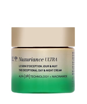 Experience the transformative power of Nuxe Nuxuriance Ultra The Exceptional Day & Night Cream. Infused with Niacinamide, this luxurious cream enhances your skin's radiance and evens out skin tone for a youthful glow. Suitable for women, this cream is designed for daily use. To apply, take a generous amount, warm it between your hands, and massage gently onto your face, working from the center outwards. For best results, use morning and night to revive your complexion and enjoy beautifully radiant skin. Size: 75 ml.