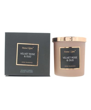The Home Lights Velvet Rose and Oud Candle is a luxurious, three-layered soy wax candle that offers a rich and captivating fragrance experience. Crafted with 100% natural soy wax and featuring non-metal wicks, this candle ensures a clean and eco-friendly burn. Its elegant design, housed in a silky-colored glass jar with a rose gold tinplate lid, adds a touch of sophistication to any space. 

Top Notes: A blend of saffron and cinnamon, providing a warm and spicy opening that awakens the senses.  
Heart Notes: The rich essence of Damask rose and geranium, offering a floral and slightly sweet core that evokes the comfort of a blooming garden. 
Base Notes: A creamy combination of oud, leather, and labdanum, delivering a smoky and resinous finish that lingers in the air. 

This candle's scent profile is designed to evoke the essence of a luxurious evening, with the warmth of spices and the depth of oud creating an enchanting atmosphere. Its long-lasting burn time of up to 130 hours makes it perfect for creating a soothing ambiance in any room.