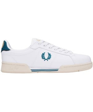 Elevate your casual style with the Fred Perry Bay Ocean White Sneaker for men. Crafted from 100% premium leather, these trainers offer both durability and a sleek, classic look. Made in Vietnam with attention to detail, they provide excellent comfort for all-day wear. The clean white design effortlessly complements any outfit, making them a versatile addition to your wardrobe. Whether you're heading out for a relaxed day or a casual evening event, these sneakers deliver timeless style and reliable quality. Step into confidence and sophistication with Fred Perry's Bay Ocean sneaker