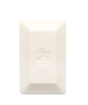 Experience the luxurious Oribe Cote d'Azur Soap Bar, a 198g fragrance-infused delight for your skin. This unisex soap combines refreshing citrus notes of Calabrian bergamot, lemon, black currant, and Sicilian orange with a floral heart of tuberose, cyclamen, and jasmine. The scent evolves into a warm base of vetiver, sandalwood, and amber, creating an indulgent bathing experience. Perfect for daily use, simply apply to damp skin and massage for a cleansing ritual that rejuvenates your senses. Elevate your skincare routine with this exquisite soap bar.
