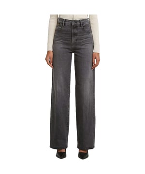 
De Deck 2.0 High Loose van G-Star Raw is een lange, zwarte jeans die meteen een nonchalante, toch verzorgde uitstraling geeft. Met een hoge taille en een relaxed, flare-achtig silhouet sluit de broek mooi aan rond de heupen en valt de pijp losser; dat creëert ruimte om te bewegen en een opvallend profiel te tonen. Door het katoen met een vleugje elasthaan rekt het materiaal zacht mee, waardoor de pasvorm meebeweegt met jouw dag. De rits- en knoopsluiting en de vijf zakken blijven praktisch aanwezig zonder af te leiden van het totaalbeeld, en het subtiele G-Star Originals label op de achterkant maakt het ontwerp herkenbaar. Draag de broek met nette of casual items om het contrast te benadrukken en speel met proporties voor een moderne look. Het is een veelzijdig item voor wie houdt van een relaxed model met karakter en een luxueuze touch. Stap erin en voel hoe stijl en gemak elkaar ontmoeten; een eenvoudige manier om met vertrouwen de deur uit te gaan.