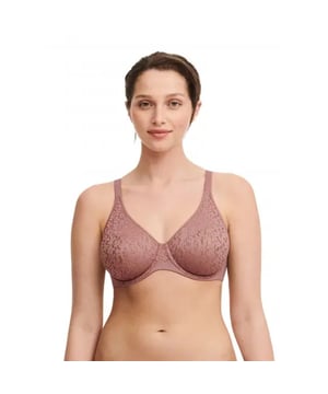 
De Norah Comfort Underwire combineert volledige ondersteuning met ongeëvenaard comfort en wordt jouw nieuwe go-to-bh. De lange, boterzachte band zorgt voor een gladmakend effect op de rug. De bloemdetails over de hele cup zorgen voor een unieke update van je dagelijkse naadloze bh, terwijl ze onzichtbaar blijven onder elk topje.


 * Nieuwe en innovatieve ongevoerde vorm met naadloos comfort


 * Interne naadconstructie langs de onderkant voor extra lift


 * Stretchkant met vrouwelijk bloemmotief


 * Meshvoering langs de bovenkant


 * Doorzichtigheid in het midden


 * Hoge turnpakjeband om de rug glad te strijken


 * Versterkte bandjes voor ondersteuning en comfort de hele dag door


 * Labelloze band


 * Ontworpen in Frankrijk


Tips van onze Fit Experts

"Wauw! Eindelijk de bh waar alle fitters op hebben gewacht! Ik vind het geweldig dat deze bh dezelfde ondersteuning biedt als een cup met naad, maar dan met de dekking en onzichtbaarheid van een T-shirt-bh. Perfect voor iedereen die een naadloze look wil. En Comfortabeler en boterzacht kan niet!"


Redacteur beoordelingen

"Chantelle is een opvallend merk in Franse lingerie geworden met zijn lijn comfortabele, stijlvolle, duurzame bh's die beschikbaar zijn voor alle bustetypes."