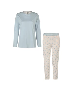 
De By Louise dames pyjama set biedt ultiem comfort en een tijdloze look. Het effen lichtblauwe T-shirt met lange mouwen voelt zacht aan op de huid, terwijl de lange pyjamabroek met off-white en lichtblauwe stippen zorgt voor een speelse touch. Dankzij de ademende katoenkwaliteit geniet je van een ontspannen nachtrust in een licht en luchtig ontwerp.