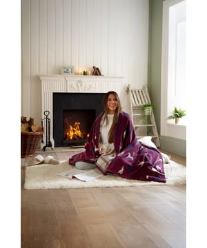 Stay snug in style with the TLC Hounds Heated Throw. Designed in a timeless check pattern, this 140x180cm blanket delivers gentle, even warmth with 10 temperature levels and rapid heating. Safety features include an auto shut-off timer for peace of mind, while its soft-touch polyester fabric ensures long-lasting comfort. Easy to clean with a removable control, it’s ideal for layering over sofas, armchairs, or beds.