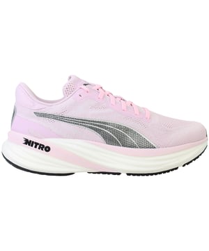 The Puma Magnify Nitro 2 Women’s Pink Running Shoes are designed for maximum cushioning and comfort. With plush Nitro foam and a supportive build, they’re perfect for long-distance runs while keeping style and performance in balance.

Key Features

Material:

Breathable engineered mesh upper for lightweight comfort.

Design:

Vibrant pink finish with sleek Puma detailing.

Midsole:

NITRO foam midsole provides superior cushioning and energy return.

Support:

Elevated stack height offers extra comfort for long-distance runs.

Fit:

Secure lace-up closure with padded collar for a locked-in feel.

Outsole:

PUMAGRIP rubber delivers durable traction on varied surfaces.

Comfort:

Plush underfoot feel reduces fatigue during extended wear.

Durability:

Reinforced construction built to handle consistent training.

Performance:

Ideal for runners who prioritise comfort, support, and endurance.